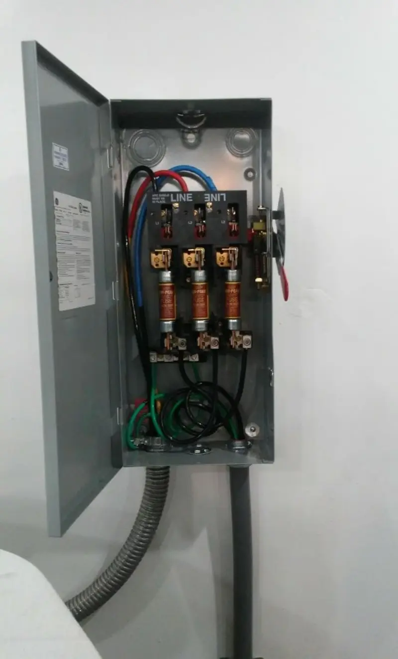 Three-phase disconnect switch installed for Smoke Detector Installation in Ash